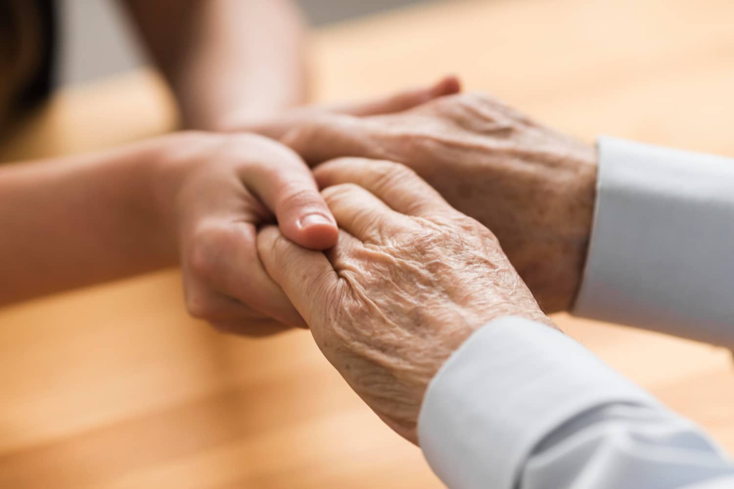 Hospice Brazos Valley - Hospice Care Two hands holding each other gently